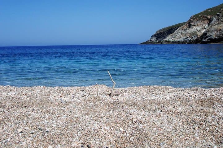 Discover Zorkos Beach: Crystal Waters and Golden Sands on Andros Island photo 2