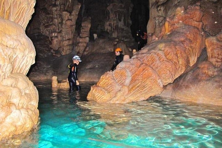 Cala Romantica Water Cave Adventure: Sea Caving, Optional 25m Abseil and Coastal Hike in Mallorca photo 1