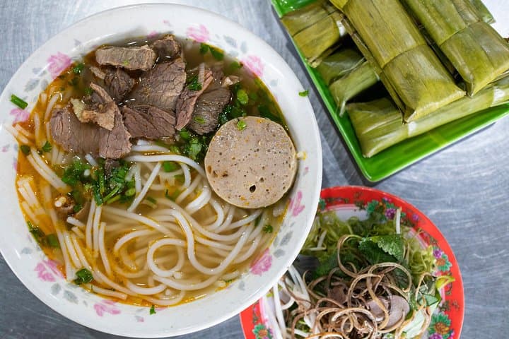 Saigon Michelin Scooter Food Tour with Female Ao Dai Guide photo 6