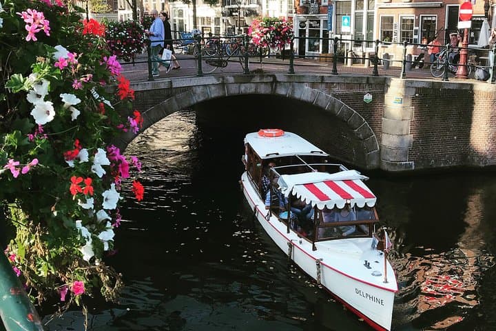 Private Amsterdam Canal Cruise on a 1915 Historic Boat — Small-Group Tour photo 1