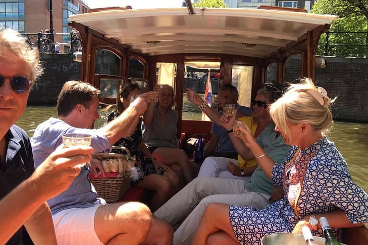 Private Amsterdam Canal Cruise on a 1915 Historic Boat — Small-Group Tour photo 2