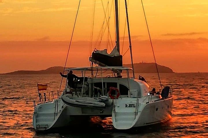 Cala Bassa Catamaran Excursion: Private Sail, Snorkel & Cliff-Jump in Ibiza photo 2