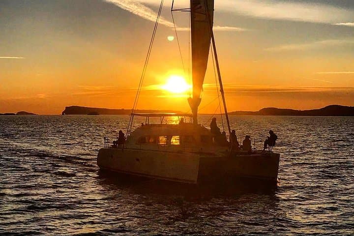 Cala Bassa Catamaran Excursion: Private Sail, Snorkel & Cliff-Jump in Ibiza photo 3