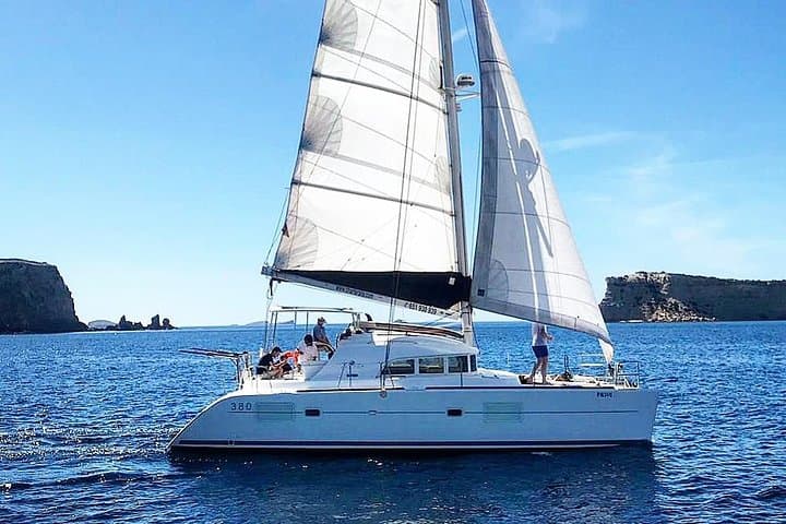 Cala Bassa Catamaran Excursion: Private Sail, Snorkel & Cliff-Jump in Ibiza photo 4