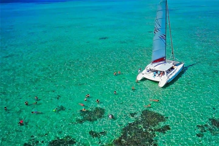 East Coast Catamaran Cruise to Ile aux Cerfs: Parasailing, Snorkel & BBQ Lunch