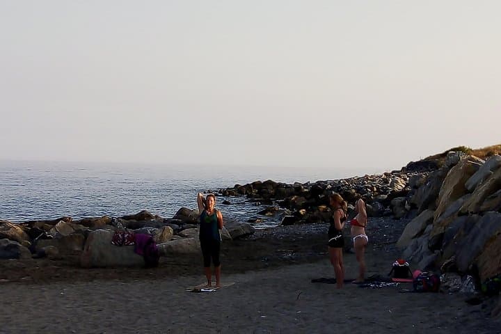 Sunrise Beach Yoga on Rome's Mediterranean Coast