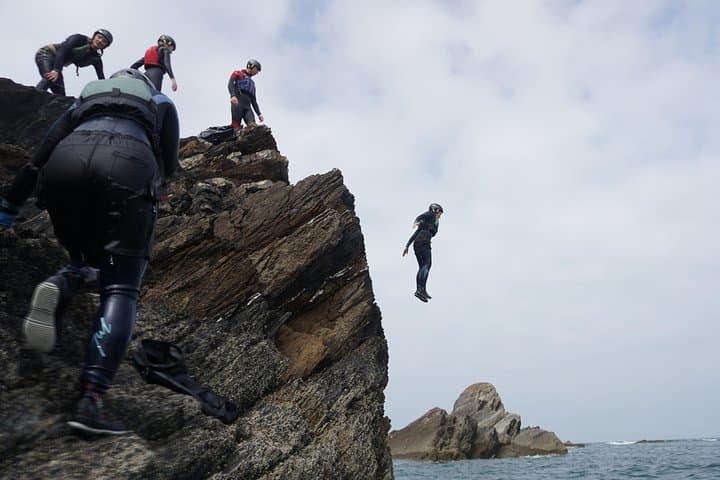 North Devon Coasteering: Cliff Jumps, Caves & Sea Traverses