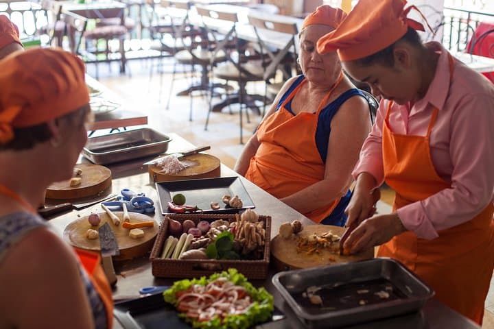 Hands-On Khmer Cooking Class and Market Tour in Siem Reap photo 2