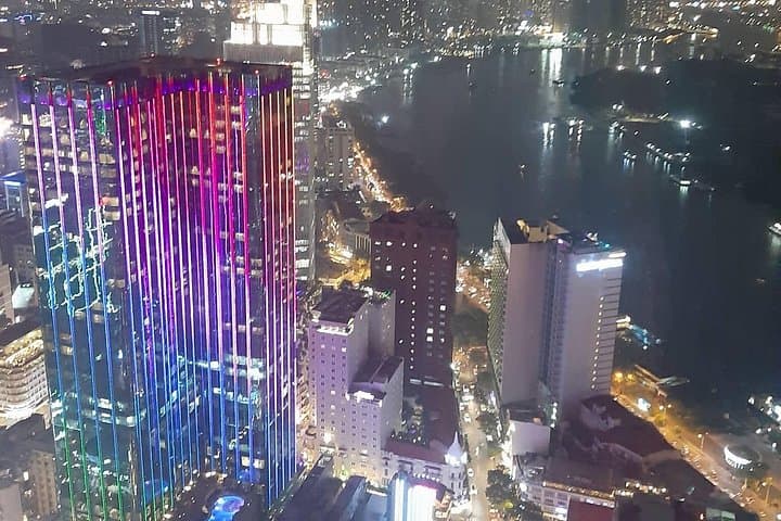 Saigon by Night: Bitexco Views, River Dinner & Motorbike Alley Tour photo 2