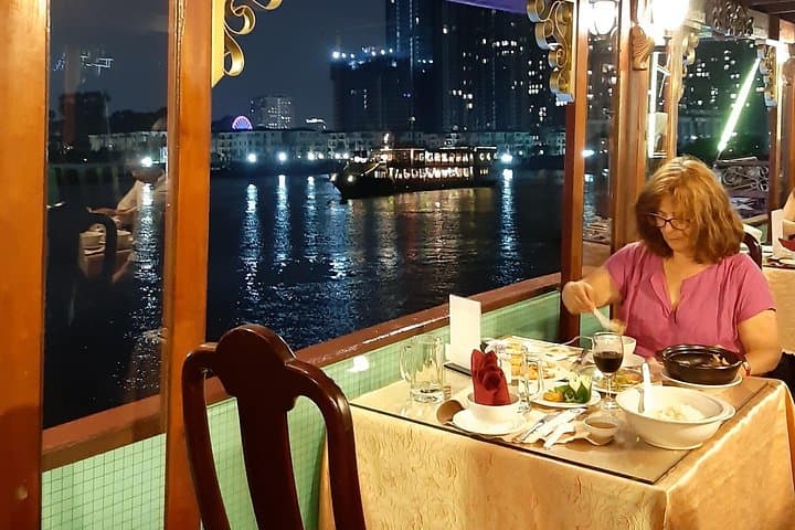 Saigon by Night: Bitexco Views, River Dinner & Motorbike Alley Tour photo 5
