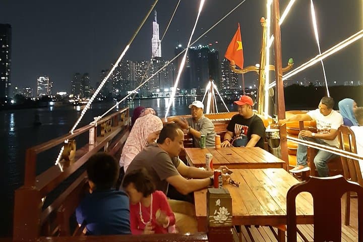 Saigon by Night: Bitexco Views, River Dinner & Motorbike Alley Tour photo 6