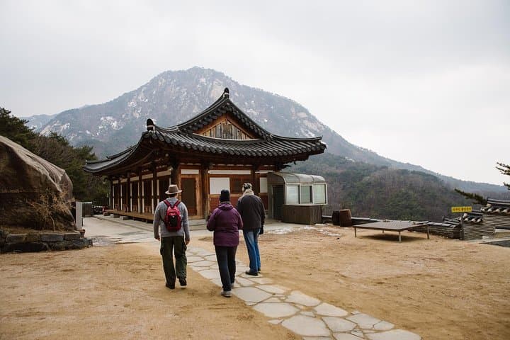 Seoul Mountain Hike: Bukhansan Temples, Folklore & Hasanju Post-Hike Meal