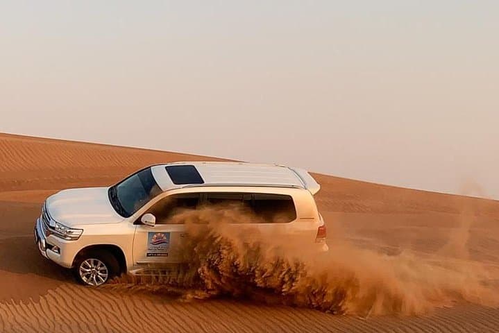 Private Lahbab Red Dunes Safari: Sandboarding, Dune Bashing & Premium Desert Camp