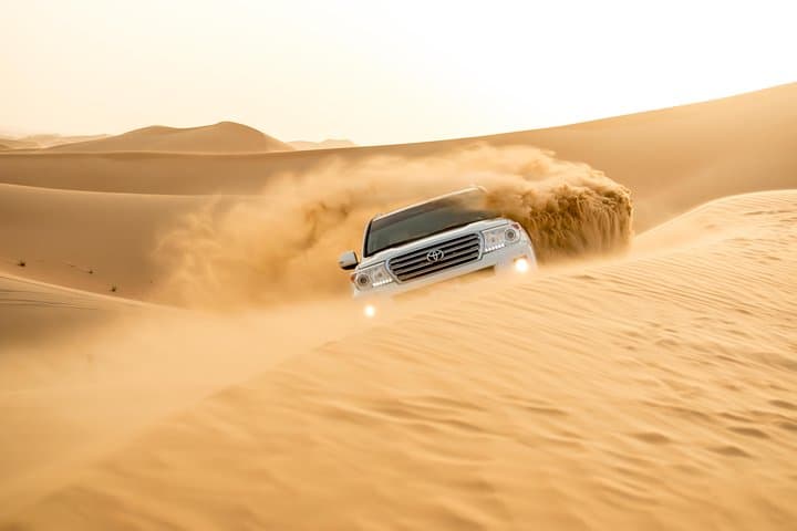 Sunrise Desert Safari from Abu Dhabi: Dune Bashing, Camel Farm & Sandboarding photo 4