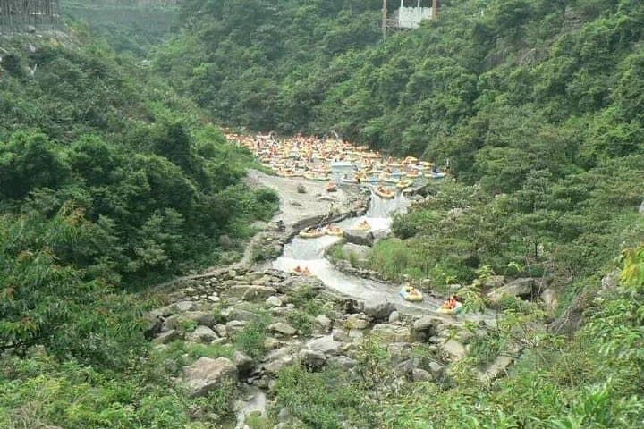 Huangteng Canyon Day Trip from Guangzhou: Glass Bridge, Rafting & 4 km Waterfall Walk photo 2