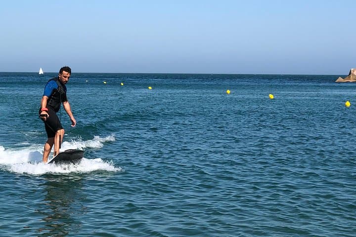 Electric Surfboard Experience in Barcelona: Ride a Motorized Board from Port Olímpic