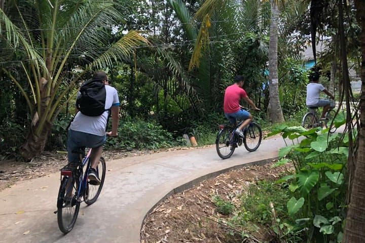 Private Non-Touristy Mekong Delta Biking Day — Markets, Canals & Coconut Gardens