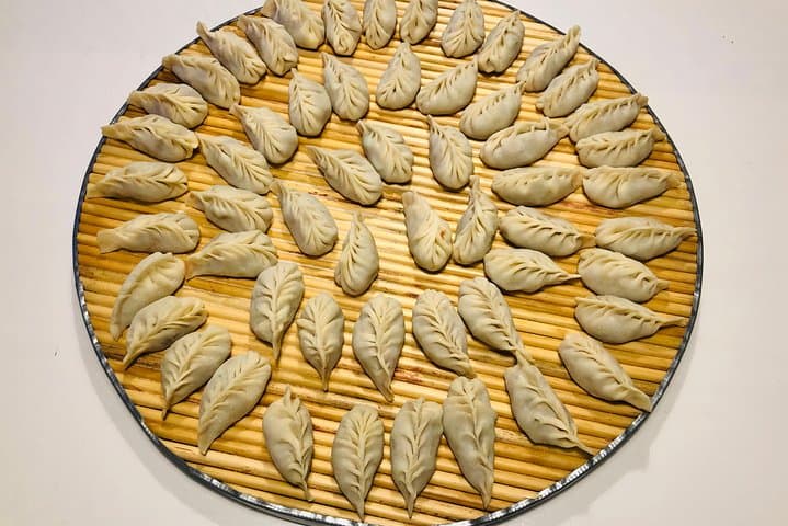 Market-to-Table Dumpling Class and Badminton in Beijing