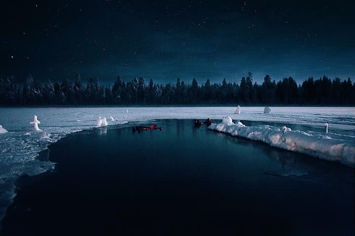 Aurora Ice Floating in Rovaniemi: Dry-Suit Northern Lights Float on a Frozen Lake photo 3