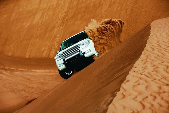 Morning Dubai Desert Safari: Dune Bashing, Quad Bike & Sandboarding Adventure