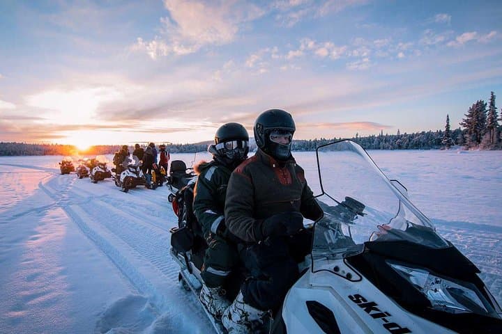 Explore the Arctic Wilderness on a Snowmobile Adventure in Kiruna