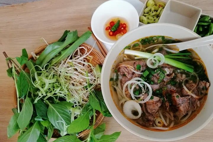 Saigon Sightseeing & Street Food Tour — Half-Day City, Markets & Local Eats photo 3