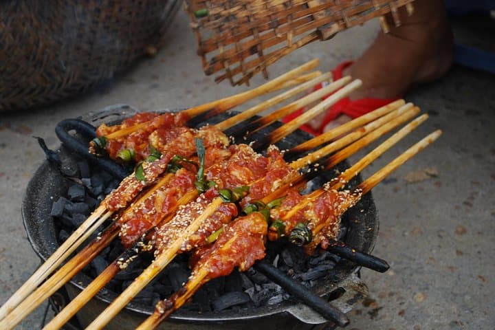 Evening Hoi An Bike Food Tour: Night Alley Eats & River BBQ photo 3