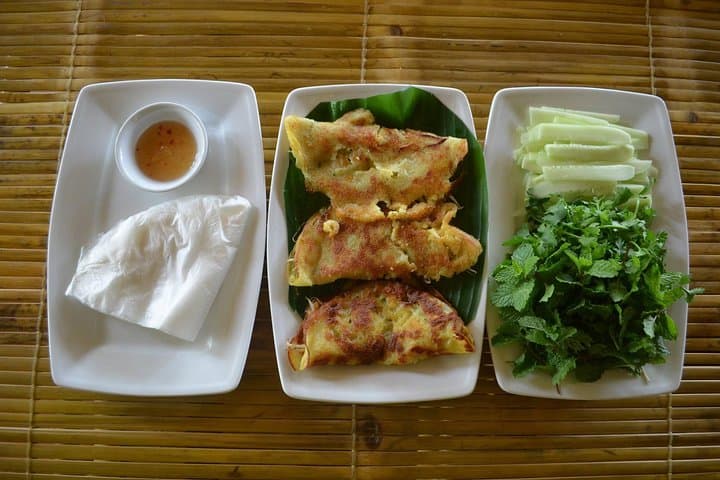 Evening Hoi An Bike Food Tour: Night Alley Eats & River BBQ photo 4