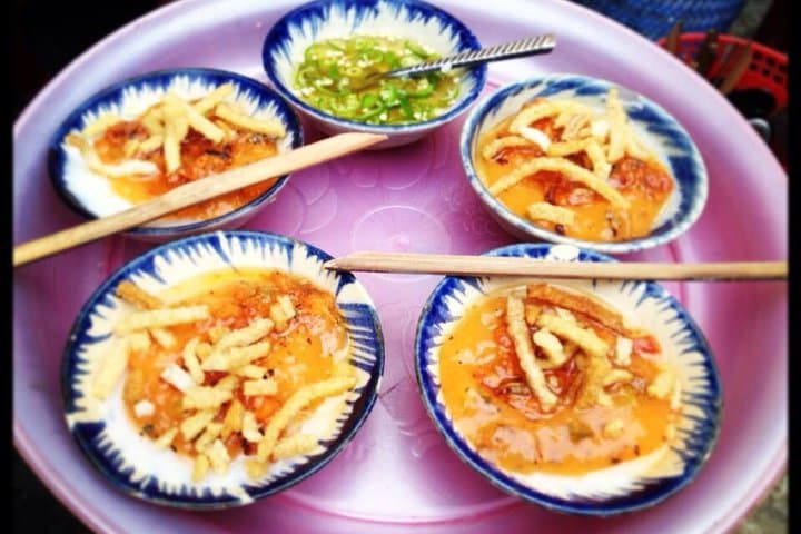 Evening Hoi An Bike Food Tour: Night Alley Eats & River BBQ photo 2