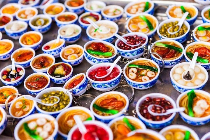 Evening Hoi An Bike Food Tour: Night Alley Eats & River BBQ