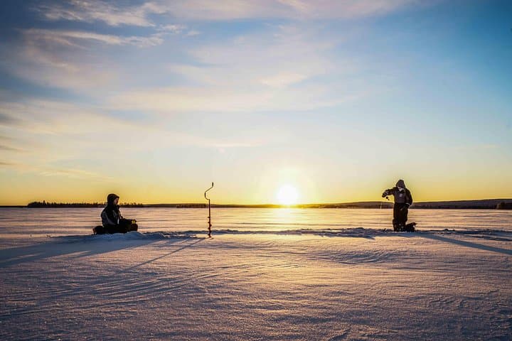 Ice Fishing Near Rovaniemi: Private Frozen-Lake Experience with Campfire and Photos