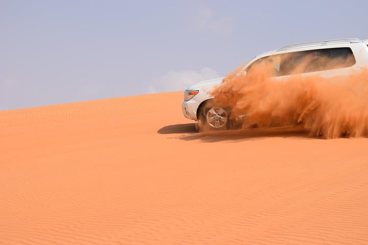 Morning Lahbab Desert Safari: Private Dune Bashing, Camel Ride & Sandboarding photo 2