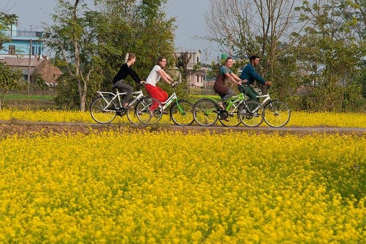 Cycling the Lowlands of Nepal: Tharu Villages & Lothar Dam Ride near Chitwan photo 6