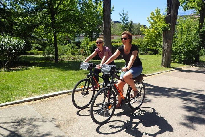 Explore Madrid by Bike: Private E-Bike and Regular City Tour from €32