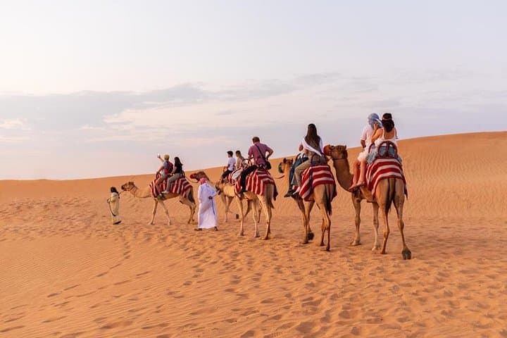 Dubai Sunset Desert Safari and Half-Day City Tour: Dune Bashing, Camel Rides & Iconic Sights photo 2