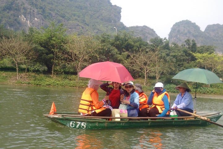 Luxury Day Trip to Bai Dinh, Trang An & Mua Cave — Boat, Biking & Viewpoint photo 2