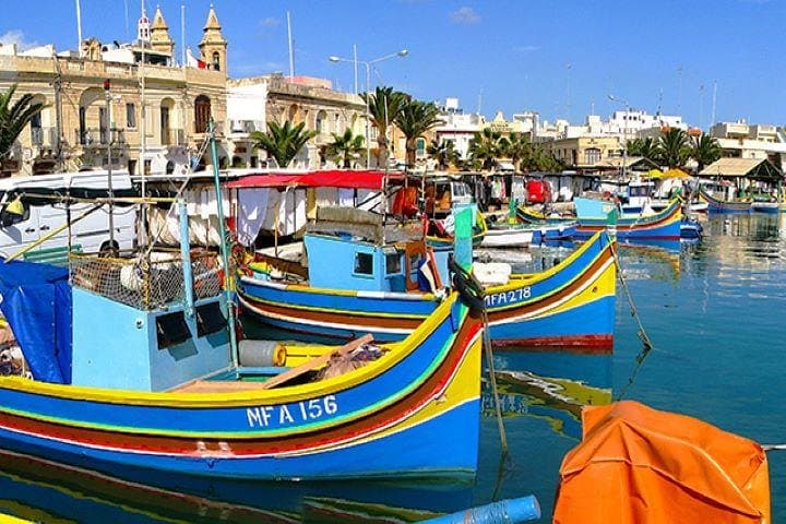 Explore Blue Grotto & Marsaxlokk: Half-Day Market, Cliffs and Boat Views from Valletta photo 6