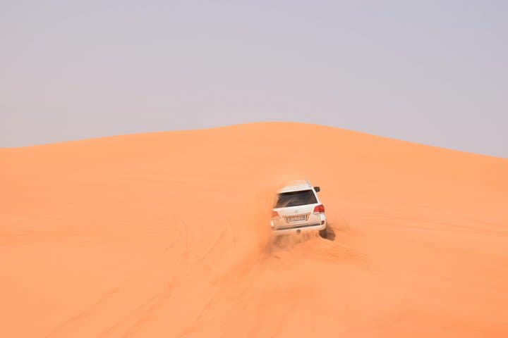 Morning Lahbab Desert Safari: Private Dune Bashing, Camel Ride & Sandboarding
