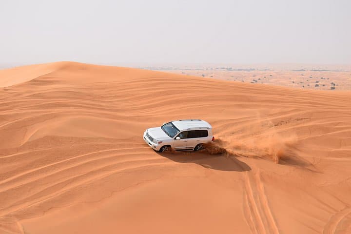 Evening Desert Safari Dubai: Dune Bashing, Camel Rides & BBQ Under the Stars photo 2