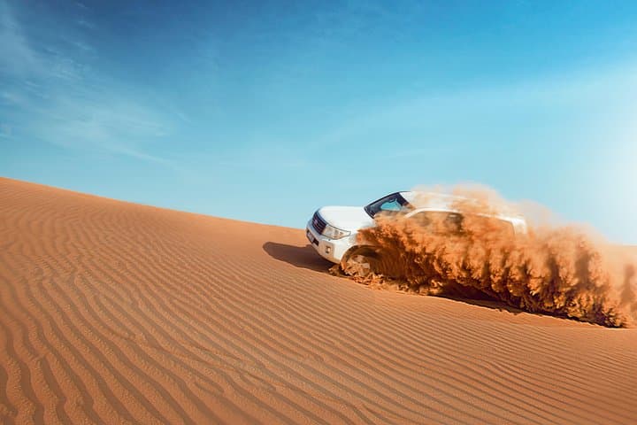 Evening Desert Safari in Dubai: Dune Bashing, Sandboarding & Bedouin Dinner photo 2