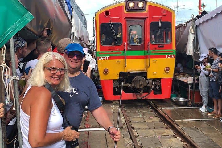 Damnoen Saduak & Mae Klong to Erawan: Floating Market, Railway Market and River Kwai Private Day Tour
