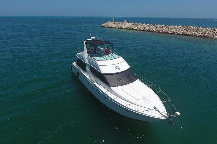 Playa Mujeres Yacht Charter — 4-Hour CA55 Private Cruise with Food & Drinks photo 1