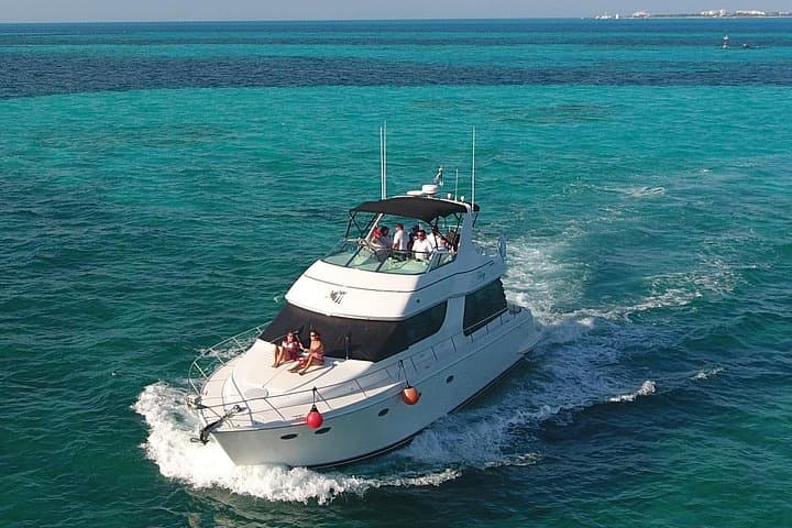Playa Mujeres Yacht Charter — 4-Hour CA55 Private Cruise with Food & Drinks photo 2