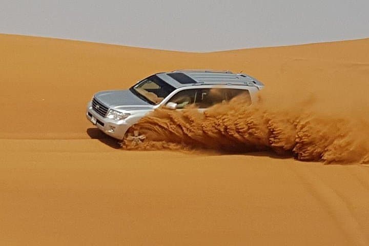 Red Dunes Desert Safari with BBQ Dinner: Sunset Dune Bashing & Desert Camp near Dubai photo 4