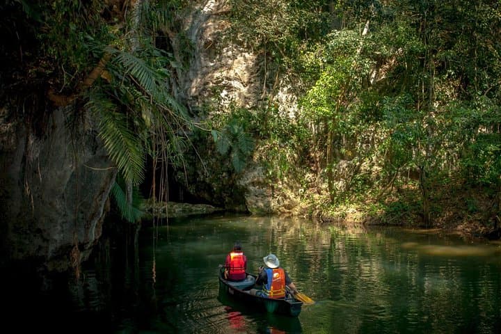 Explore Barton Creek Cave by Canoe and Plunge at Big Rock Falls — San Ignacio Day Trip