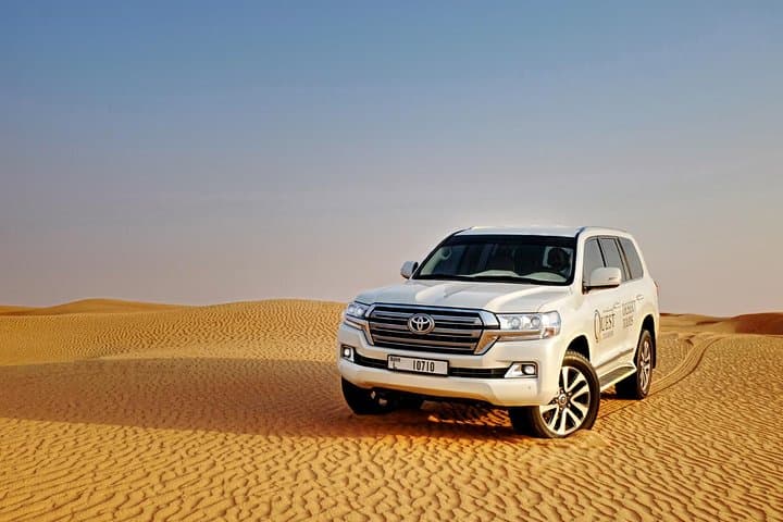 Dubai Desert Safari: Dune Bashing, Camel Rides & Sunset BBQ Experience