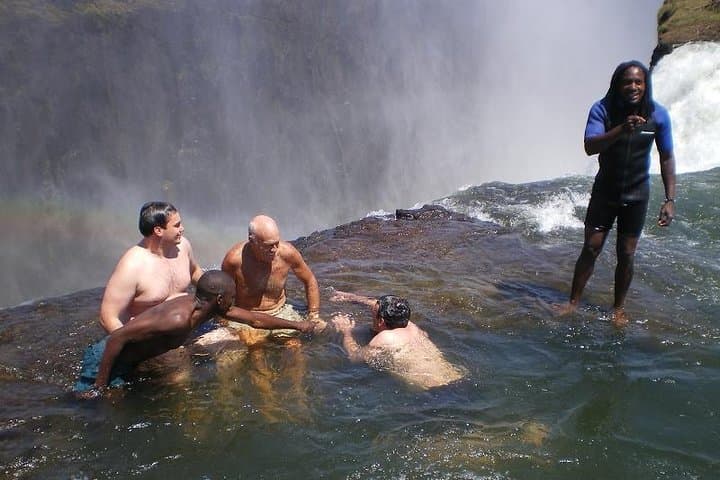 Swimming Devil's Pool & Livingstone Island: Victoria Falls Small-Group Tour photo 4