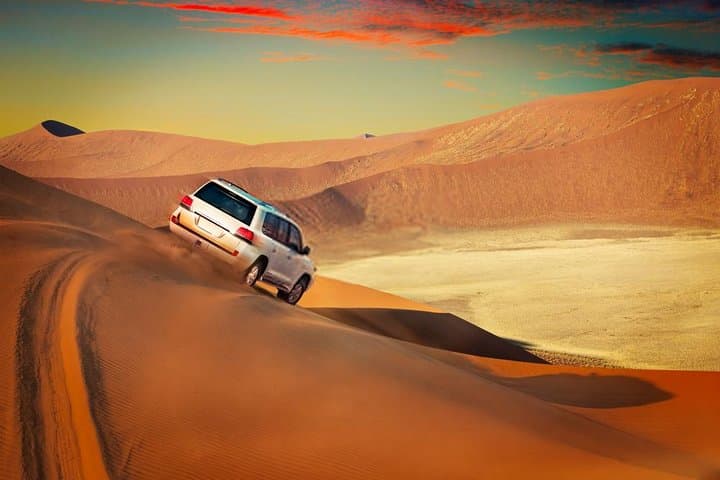 Dubai Red Dune Desert Safari: BBQ, Camel Ride & Sandboarding