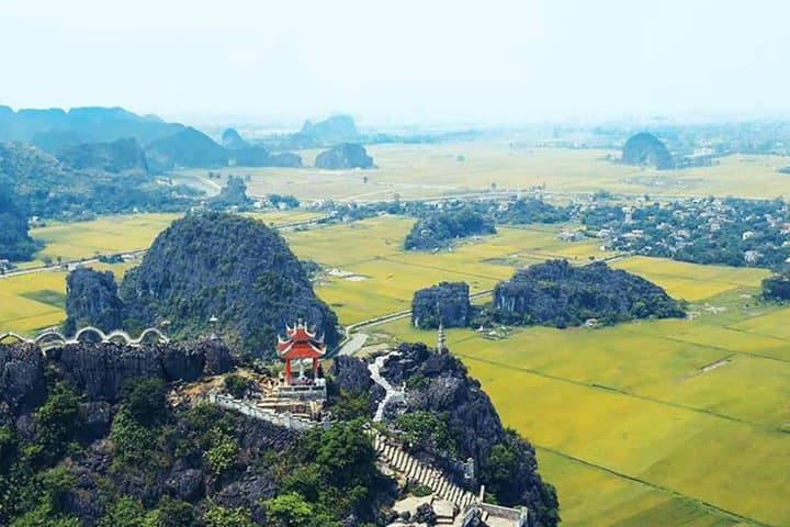 Hoa Lu & Tam Coc Full-Day: Boat Sampan, Ancient Temples, Countryside Cycling photo 6