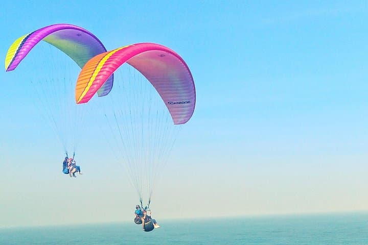 Tandem Paragliding Over Uluwatu Cliff: Bali Coastal Flight with Photos photo 1